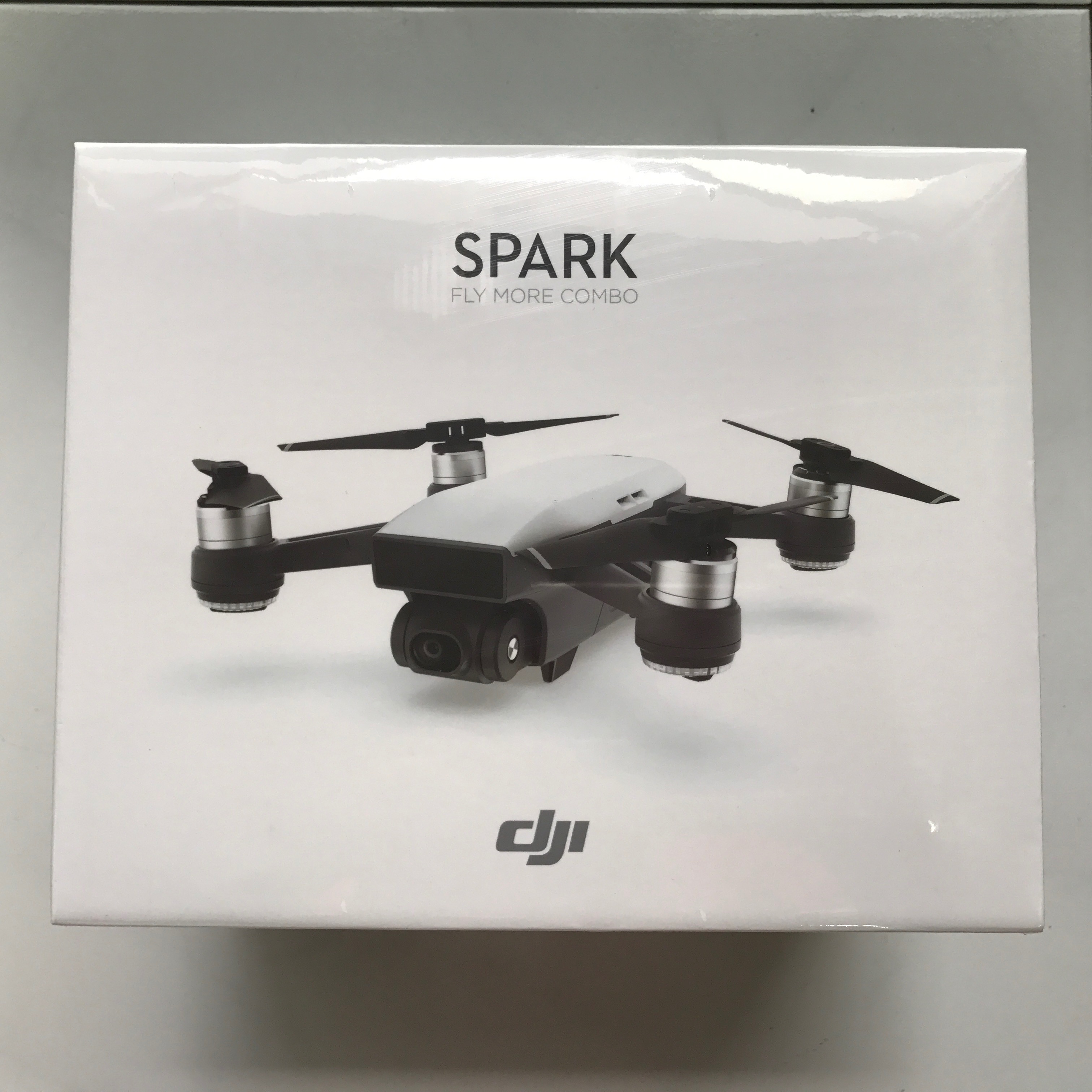Flying spark. DJI Spark Fly more Combo обзор. DJI Spark шлейф. DJI package. Spark 3 Combo купить.